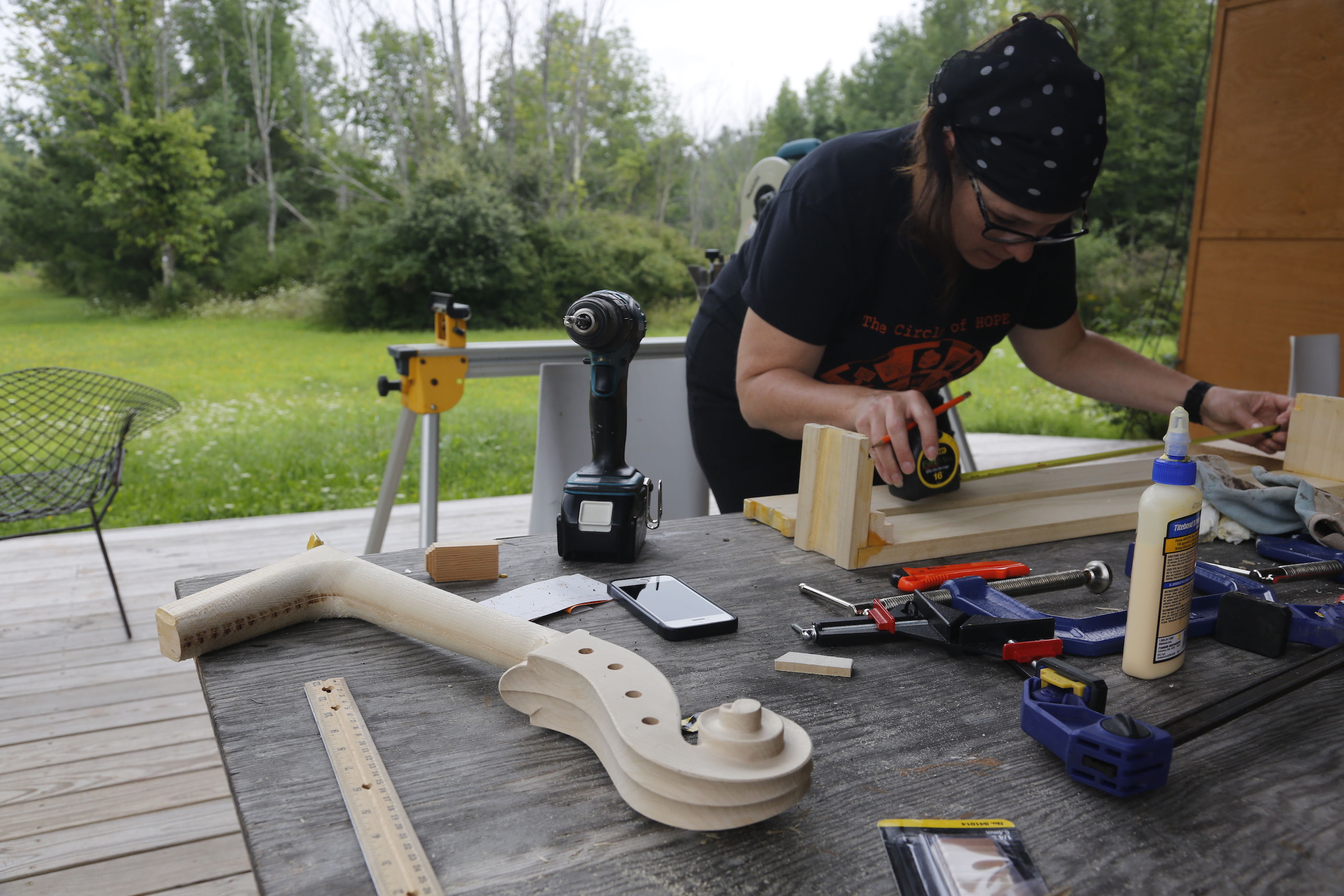 Amanda Dawn Christie Measuring While Building Cello Parts