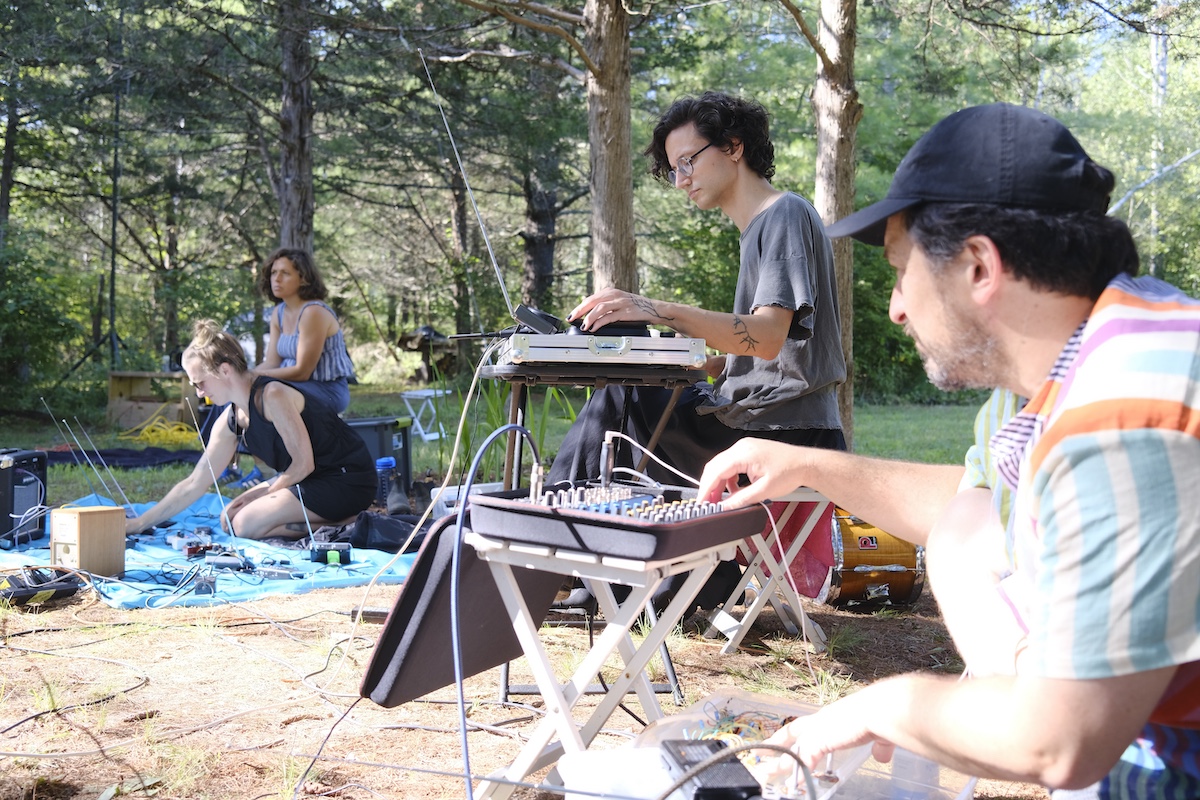 Meredith Kooi, Kenji Garland, and Andy Stuhl performing at Wave Farm on August 2, 2025