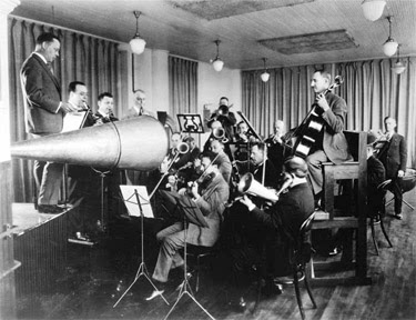 Example of "acoustic" recording; funnel-like metal horns capture sound vibrations sent to a stylus that cut into a soft wax master, Library of Congress.