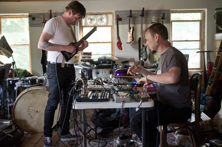 Pas Musique in action. Turns out that paddle is a travel guitar